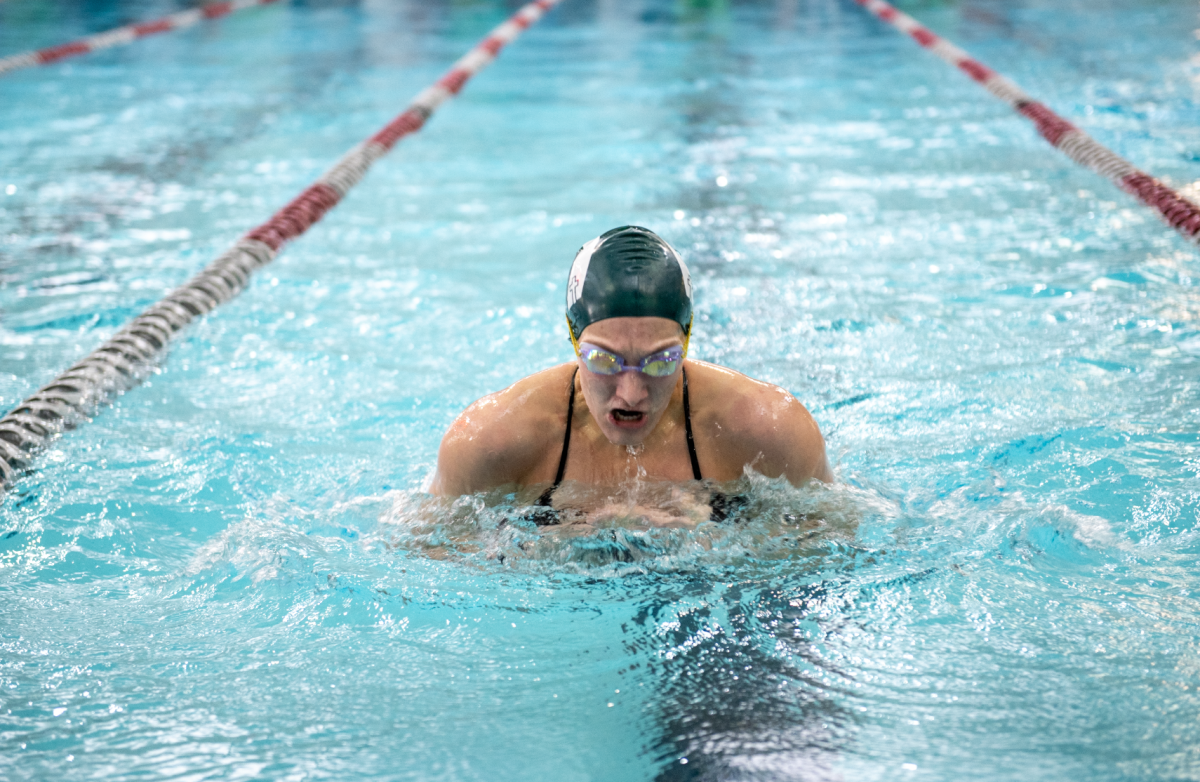 2.1.25 Senior Allison Elings swimming breaststroke in the 200 IM. 